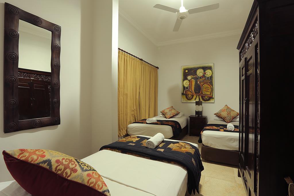 كوتا Bali Holiday Villas Kuta الغرفة الصورة